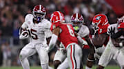 Sep 27, 2025; Athens, Georgia, USA; Alabama Crimson Tide wide receiver Germie Bernard (5) runs against Georgia Bulldogs defensive back Daylen Everette (6) in the second half at Sanford Stadium. Mandatory Credit: Brett Davis-Imagn Images