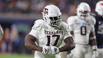 Nov 23, 2024; Auburn, Alabama, USA;  Texas A&M Aggies defensive lineman Albert Regis (17) reacts after making a tackle against the Auburn Tigers in the third quarter at Jordan-Hare Stadium. Mandatory Credit: John Reed-Imagn Images
