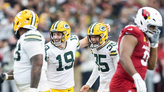 Green Bay Packers kicker Lucas Havrisik celebrates a field goal with punter Daniel Whelan (19) against the Arizona Cardinals
