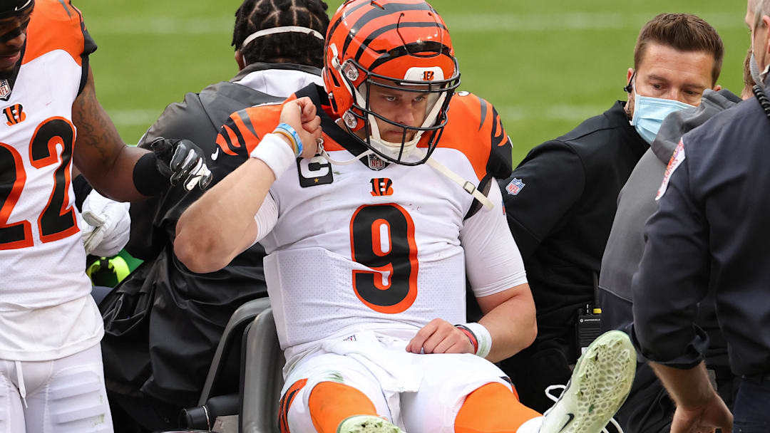 Nov 22, 2020; Landover, Maryland, USA; Cincinnati Bengals quarterback Joe Burrow (9) is carted off the field after injuring his left leg against the Washington Football Team at FedExField. Mandatory Credit: Geoff Burke-Imagn Images