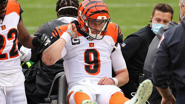 Nov 22, 2020; Landover, Maryland, USA; Cincinnati Bengals quarterback Joe Burrow (9) is carted off the field after injuring his left leg against the Washington Football Team at FedExField. Mandatory Credit: Geoff Burke-Imagn Images