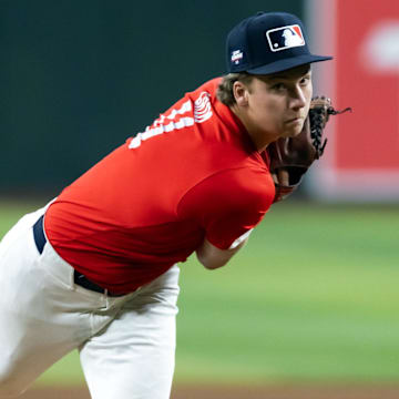 Ethan Grim, a pitcher out of Governor Mifflin High School in Pennsylvania, throws on the mound at the MLB Draft Combine in June at Chase Field in Phoenix, Arizona. A Virginia Tech baseball signee, Grim could be selected in the first few rounds of the 2025 MLB Draft this weekend.