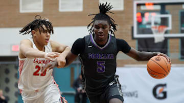 Jan 4, 2025; Gilbert, AZ, USA; Gonzaga (DC) guard Nykolas Lewis (5) against Chaminade (MO) guard Elijah Poniewaz (25) during the Hoophall West High School Invitational at Highland High School. Mandatory Credit: Mark J. Rebilas-Imagn Images