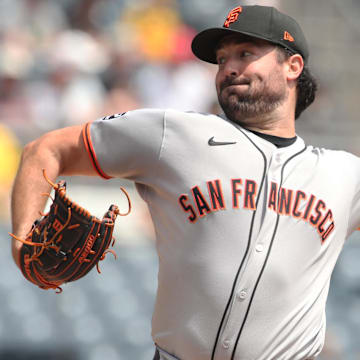 Aug 6, 2025; Pittsburgh, Pennsylvania; San Francisco Giants starting pitcher Robbie Ray (38) delivers a pitch against the Pittsburgh Pirates during the first inning at PNC Park. 