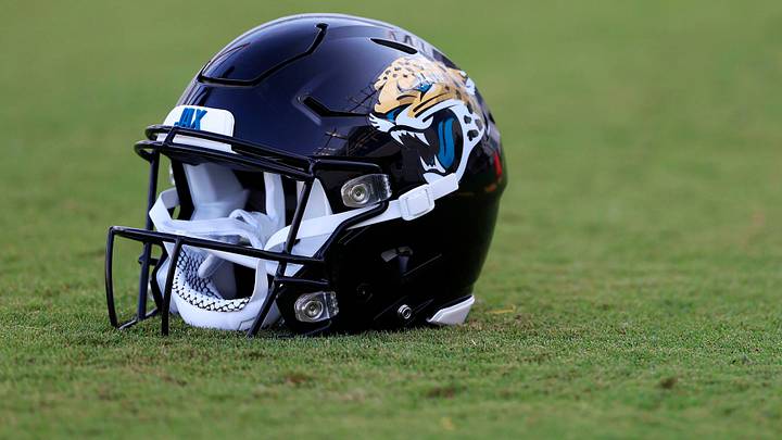 A Jacksonville Jaguars helmet lies on the turf Wednesday, July 26, 2023 at Miller Electric Center at EverBank Stadium in Jacksonville, Fla. Today marked the first day of training camp for the Jacksonville Jaguars.