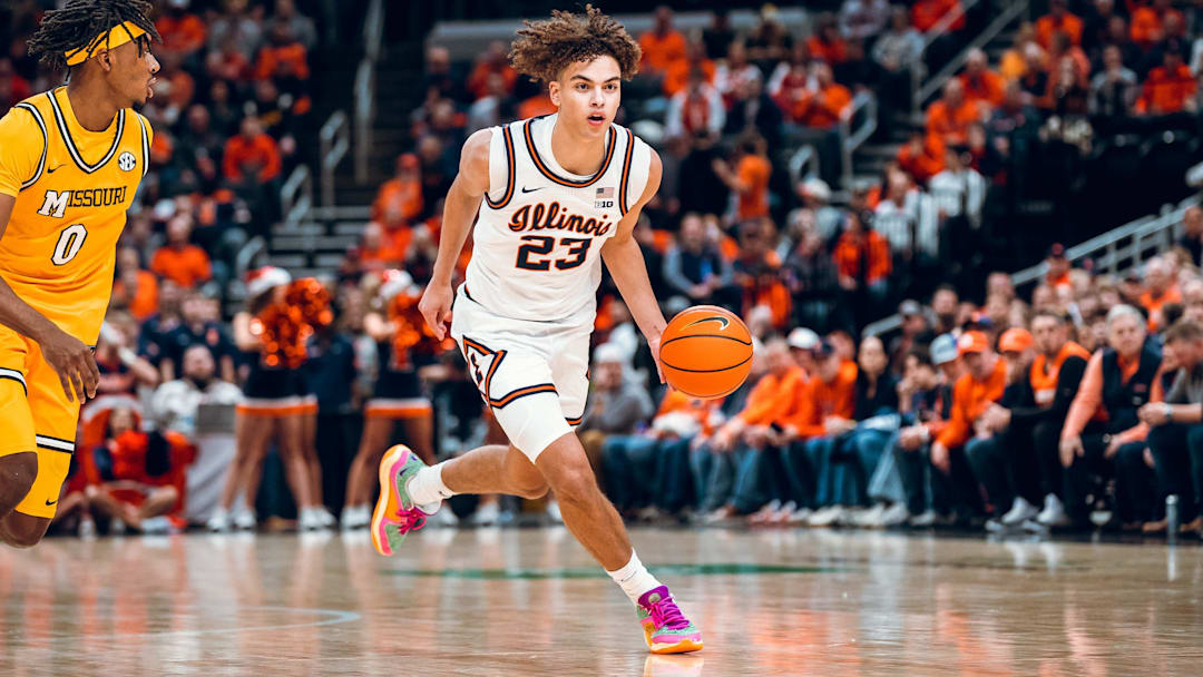 Illinois guard Keaton Wagler (23) dribbles up the floor against Missouri in the Illini's 91-48 win over the Tigers on Monday at the Enterprise Center in St. Louis, Missouri.