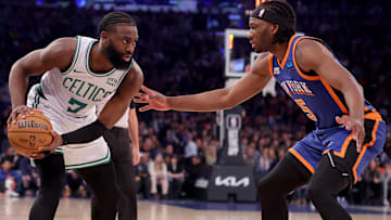 Boston Celtics guard Jaylen Brown (7) controls the ball against New York Knicks forward Precious Achiuwa (5) during the first quarter at Madison Square Garden.