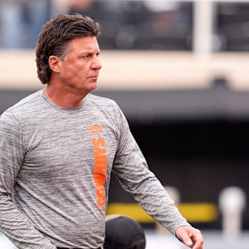 Oklahoma State head football coach Mike Gundy watches warm ups before the first half the college football game between the Oklahoma State Cowboys and the Arizona State Sun Devils at Boone Pickens Stadium in Stillwater, Okla., Saturday, Nov., 2, 2024.
