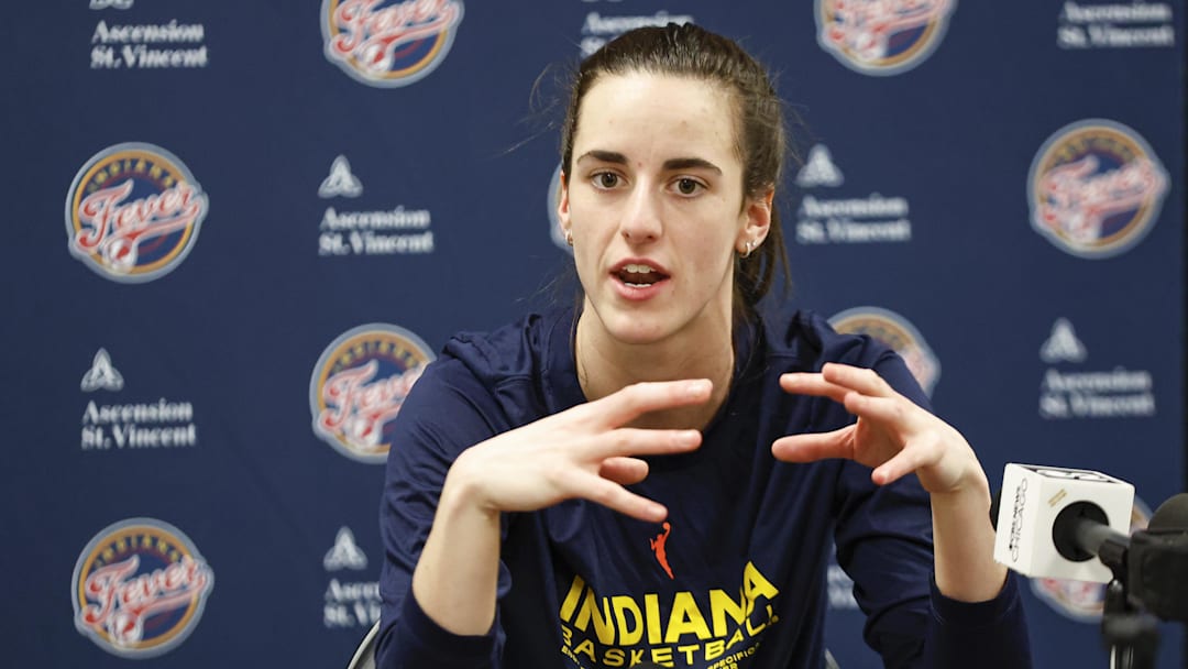 Jun 23, 2024; Chicago, Illinois, USA; Indiana Fever guard Caitlin Clark (22) speaks during a press conference before a game against the Chicago Sky at Wintrust Arena. Mandatory Credit: Kamil Krzaczynski-Imagn Images