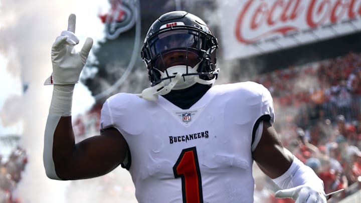 Sep 8, 2024; Tampa, Florida, USA;  Tampa Bay Buccaneers running back Rachaad White (1) runs out of the tunnel as they are introduced before the game Washington Commanders at Raymond James Stadium. Mandatory Credit: Kim Klement Neitzel-Imagn Images