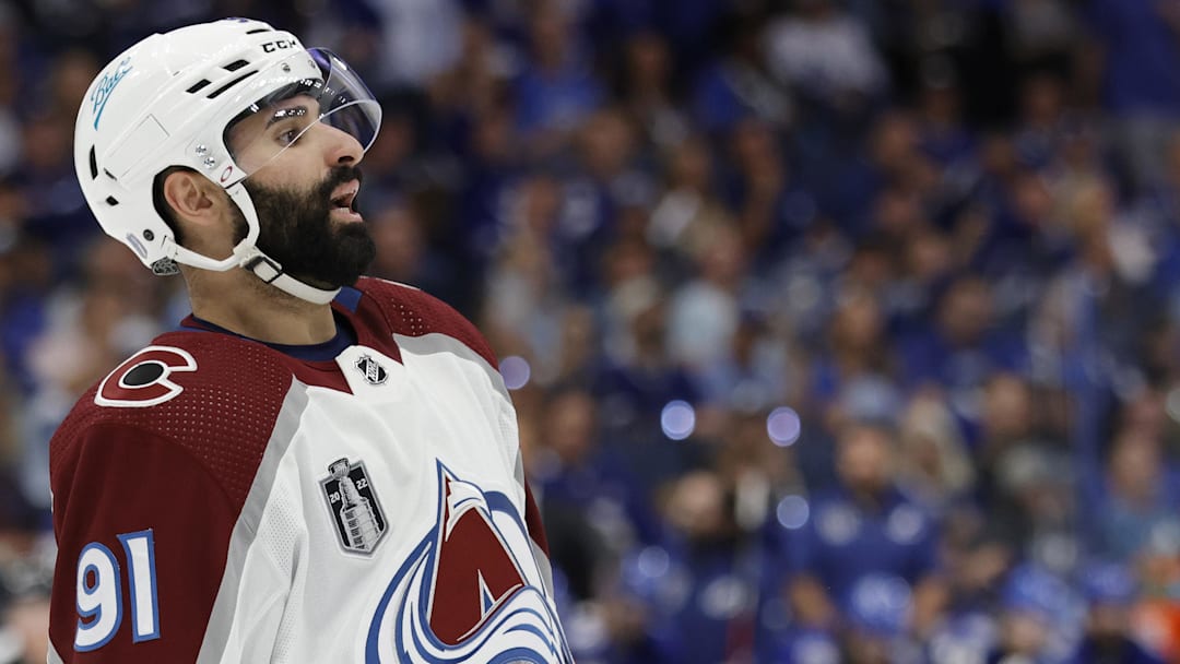 Jun 22, 2022; Tampa, Florida, USA; Colorado Avalanche center Nazem Kadri (91) stands on the ice prior to a face-off against the Tampa Bay Lightning in the third period in game four of the 2022 Stanley Cup Final at Amalie Arena. Mandatory Credit: Geoff Burke-Imagn Images Jun 22, 2022; Tampa, Florida, USA; Colorado Avalanche center Nazem Kadri (91) stands on the ice prior to a face-off against the Tampa Bay Lightning in the third period in game four of the 2022 Stanley Cup Final at Amalie Arena. Mandatory Credit: Geoff Burke-Imagn Images