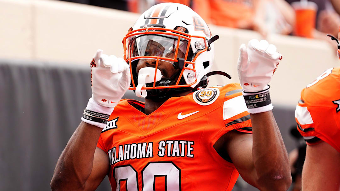 Oklahoma State's Brennan Presley (80) celebrates a touchdown in the first half of the college football game between the Oklahoma State Cowboys and South Dakota State Jackrabbits at Boone Pickens Stadium in Stillwater, Okla., Saturday, Aug., 31, 2024.