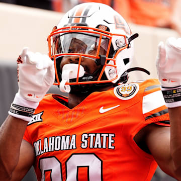 Oklahoma State's Brennan Presley (80) celebrates a touchdown in the first half of the college football game between the Oklahoma State Cowboys and South Dakota State Jackrabbits at Boone Pickens Stadium in Stillwater, Okla., Saturday, Aug., 31, 2024.