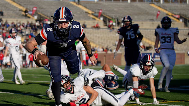 Nashville Christian's Jared Curtis (2) runs in a touchdown against Columbia Academy