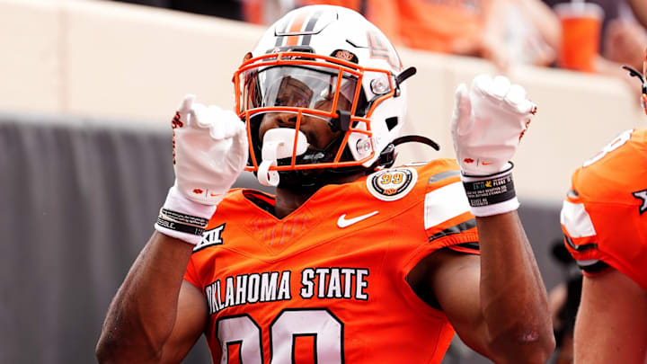 Oklahoma State's Brennan Presley (80) celebrates a touchdown in the first half of the college football game between the Oklahoma State Cowboys and South Dakota State Jackrabbits at Boone Pickens Stadium in Stillwater, Okla., Saturday, Aug., 31, 2024.