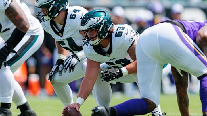 Aug 24, 2024; Philadelphia, Pennsylvania, USA; Philadelphia Eagles center Dylan McMahon (63) prepares to snap the ball against the Minnesota Vikings during the second quarter at Lincoln Financial Field. Mandatory Credit: Caean Couto-Imagn Images