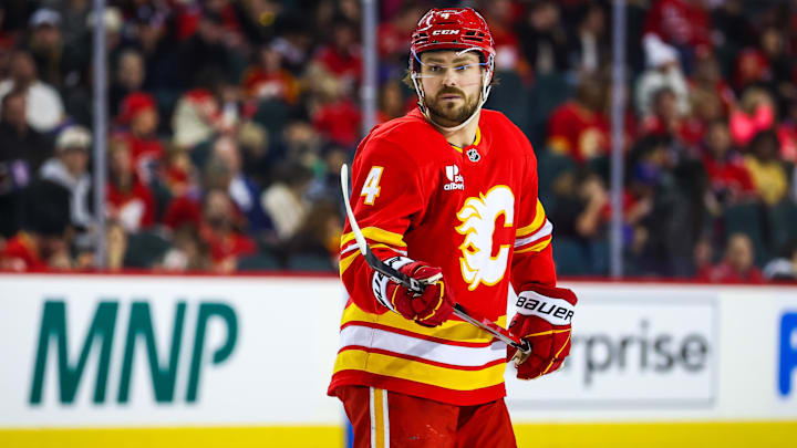 Jan 3, 2026; Calgary, Alberta, CAN; Calgary Flames defenseman Rasmus Andersson (4) against the Nashville Predators during the second period at Scotiabank Saddledome. Mandatory Credit: Sergei Belski-Imagn Images