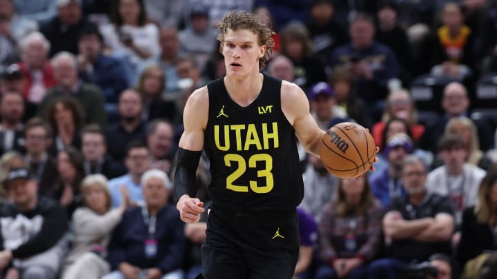 Mar 27, 2024; Salt Lake City, Utah, USA; Utah Jazz forward Lauri Markkanen (23) brings the ball up the court against the San Antonio Spurs during the first quarter at Delta Center.