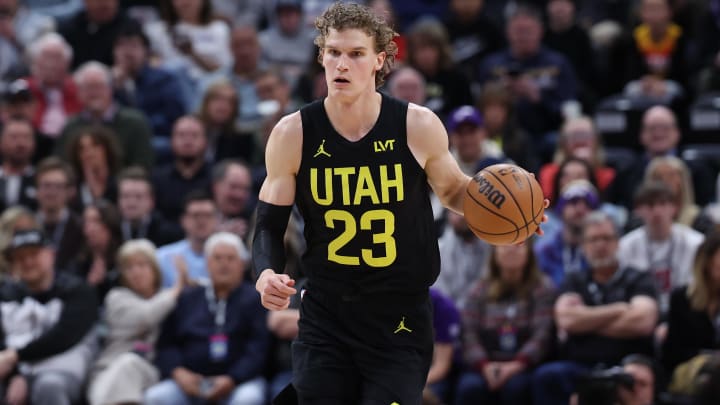 Mar 27, 2024; Salt Lake City, Utah, USA; Utah Jazz forward Lauri Markkanen (23) brings the ball up the court against the San Antonio Spurs during the first quarter at Delta Center.