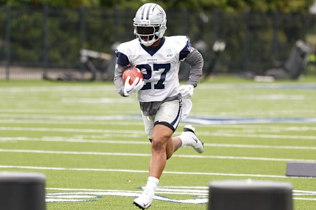 Dallas Cowboys running back Miles Sanders goes through a drill during practice at the Ford Center