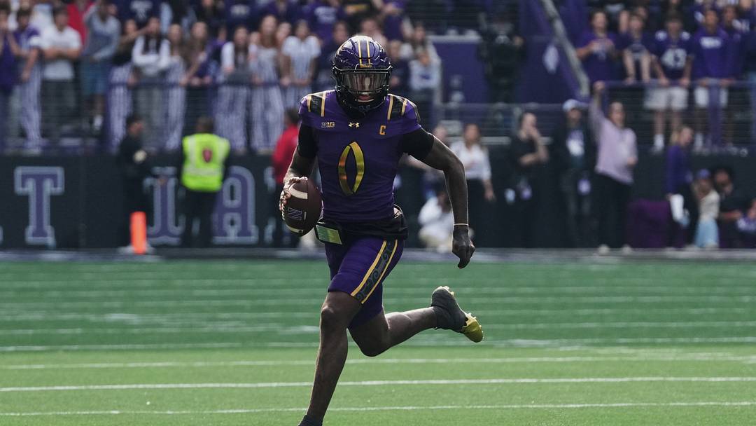 Oct 24, 2026; Evanston, Illinois, USA;  Northwestern Wildcats quarterback Aidan Chiles (0) runs with the ball against the Rutgers Scarlet Knights during the first half at New Ryan Field.  Mandatory Credit: David Banks-Imagn Images