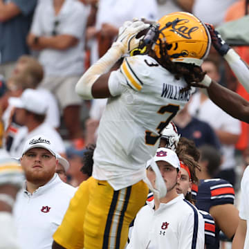 Cal cornerback Nohl Williams  intercepts a pass late in Saturday's game