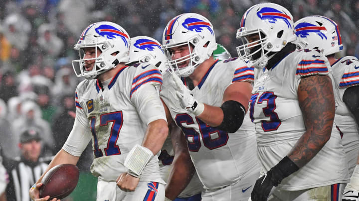 Nov 26, 2023; Philadelphia, Pennsylvania, USA; Buffalo Bills quarterback Josh Allen (17) celebrates his touchdown with guard Connor McGovern (66) and offensive tackle Dion Dawkins (73) against the Philadelphia Eagles at Lincoln Financial Field. Mandatory Credit: Eric Hartline-USA TODAY Sports