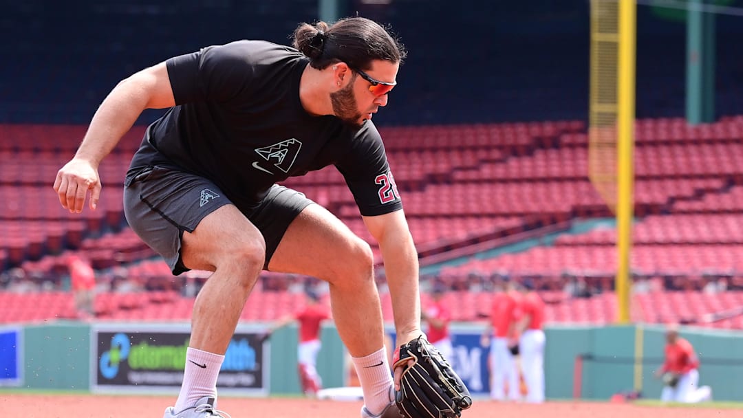 Aug 25, 2024; Boston, Massachusetts, USA; Arizona Diamondbacks third baseman Eugenio Suarez (28) warms up before a game against the Boston Red Sox at Fenway Park. Mandatory Credit: Eric Canha-Imagn Images Aug 25, 2024; Boston, Massachusetts, USA; Arizona Diamondbacks third baseman Eugenio Suarez (28) warms up before a game against the Boston Red Sox at Fenway Park. Mandatory Credit: Eric Canha-Imagn Images