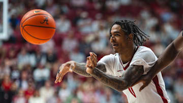 Feb 25, 2025; Tuscaloosa, Alabama, USA; Alabama Crimson Tide guard Labaron Philon (0) passes against the Mississippi State Bulldogs during the second half at Coleman Coliseum. Mandatory Credit: Will McLelland-Imagn Images