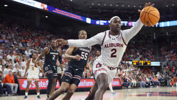 Feb 14, 2024; Auburn, Alabama, USA; Auburn Tigers forward Jaylin Williams (2) goes for a loose ball