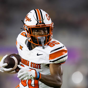 Sep 9, 2023; Tempe, Arizona, USA; Oklahoma State Cowboys wide receiver Brennan Presley (80) against the Arizona State Sun Devils at Mountain America Stadium. Mandatory Credit: Mark J. Rebilas-Imagn Images