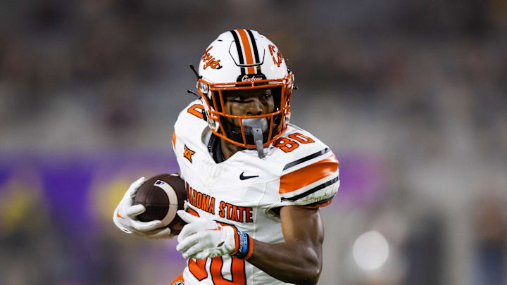 Sep 9, 2023; Tempe, Arizona, USA; Oklahoma State Cowboys wide receiver Brennan Presley (80) against the Arizona State Sun Devils at Mountain America Stadium. Mandatory Credit: Mark J. Rebilas-Imagn Images