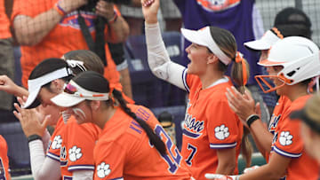 Clemson senior Reese Basinger (7) celebrates after Clemson sophomore Kylee Johnson (3) hit a home run during the bottom of the fourth inning of the NCAA Softball Tournament Clemson Regional at McWhorter Stadium in Clemson Friday, May 16, 2025.