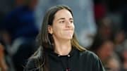 Sep 30, 2025; Las Vegas, Nevada, USA; Indiana Fever guard Caitlin Clark (22) reacts from the bench after a play made by the Las Vegas Aces during the fourth quarter of game five of the second round for the 2025 WNBA Playoffs at Michelob Ultra Arena. Mandatory Credit: Stephen R. Sylvanie-Imagn Images