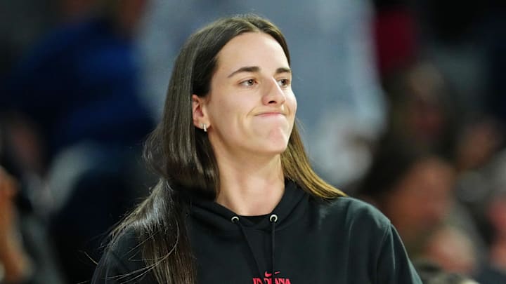 Sep 30, 2025; Las Vegas, Nevada, USA; Indiana Fever guard Caitlin Clark (22) reacts from the bench after a play made by the Las Vegas Aces during the fourth quarter of game five of the second round for the 2025 WNBA Playoffs at Michelob Ultra Arena. Mandatory Credit: Stephen R. Sylvanie-Imagn Images