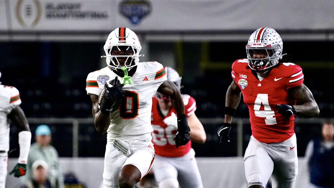 Keionte Scott runs back an interception for a touchdown at AT&T Stadium on Dec. 31, 2025.