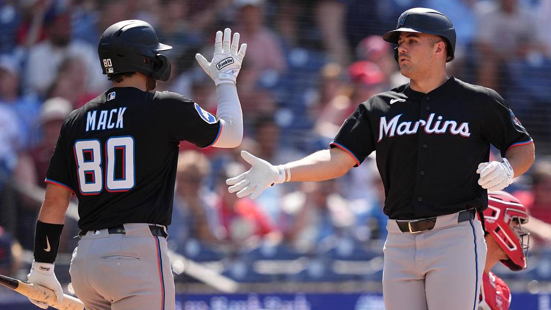 Miami Marlins outfielder Jakob Marsee and catcher Joe Mack