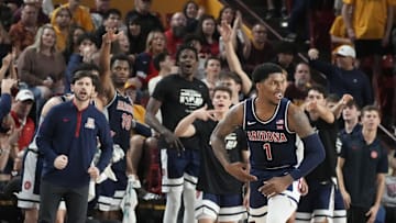 Feb 1, 2025; Tempe, Ariz., U.S.; Arizona Wildcats guard Caleb Love (1) reacts after sinking a 3-point shot during a Big 12 menÕs basketball game against the Arizona State Sun Devils at Desert Financial Arena.