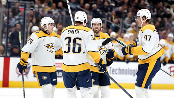 Apr 1, 2025; Columbus, Ohio, USA; Nashville Predators defenseman Jordan Oesterle (82) celebrates his goal against the Columbus Blue Jackets during the third period at Nationwide Arena. Mandatory Credit: Russell LaBounty-Imagn Images