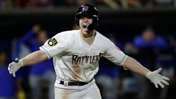 Wisconsin Timber Rattlers' Luke Adams (28) celebrates after hitting a game-winning single to right field against the Quad Cities River Bandits during their Midwest League playoff baseball game Thursday, September 12, 2024, at Neuroscience Group Field at Fox Cities Stadium in Grand Chute, Wisconsin., Wisconsin. The Rattlers won 7-6 and move on to face Lake County in the Midwest League Championship Series starting Sunday.