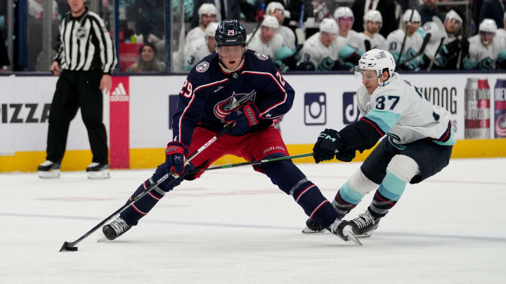 Mar 3, 2023; Columbus, Ohio, USA; Columbus Blue Jackets left wing Patrik Laine (29) skates against Seattle Kraken center Yanni Gourde (37) during the second period at Nationwide Arena. Mandatory Credit: Jason Mowry-USA TODAY Sports