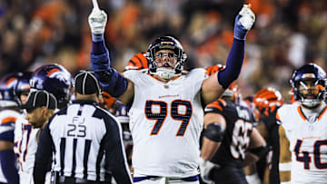 Dec 28, 2024; Cincinnati, Ohio, USA; Denver Broncos defensive end Zach Allen (99) reacts after a play against the Cincinnati Bengals in the second half at Paycor Stadium. Mandatory Credit: Katie Stratman-Imagn Images