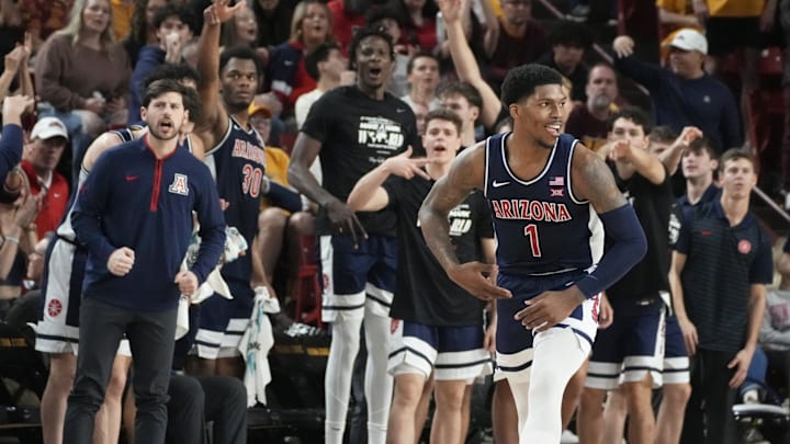Feb 1, 2025; Tempe, Ariz., U.S.; Arizona Wildcats guard Caleb Love (1) reacts after sinking a 3-point shot during a Big 12 menÕs basketball game against the Arizona State Sun Devils at Desert Financial Arena.