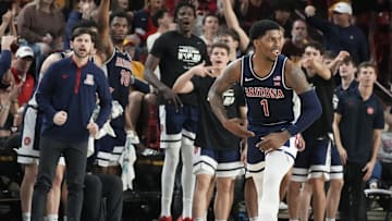 Feb 1, 2025; Tempe, Ariz., U.S.; Arizona Wildcats guard Caleb Love (1) reacts after sinking a 3-point shot during a Big 12 menÕs basketball game against the Arizona State Sun Devils at Desert Financial Arena.