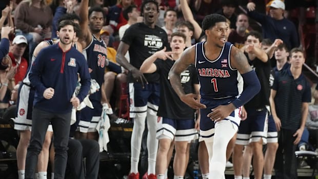 Arizona Wildcats guard Caleb Love (1) reacts after sinking a 3-point shot 