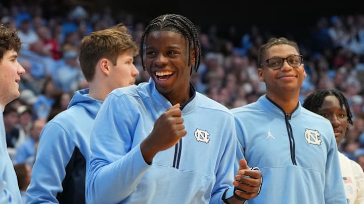 Feb 14, 2026; Chapel Hill, North Carolina, USA; North Carolina Tar Heels forward Caleb Wilson (8) reacts on the bench in the second half at Dean E. Smith Center. Mandatory Credit: Bob Donnan-Imagn Images