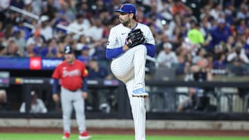 Aug 13, 2025; New York City, New York, USA;  New York Mets starting pitcher David Peterson (23) pitches in the first inning against the Atlanta Braves at Citi Field. Mandatory Credit: Wendell Cruz-Imagn Images