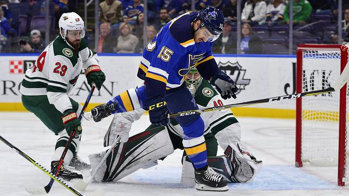 Nov 11, 2018; St. Louis, MO, USA; St. Louis Blues center Robby Fabbri (15) looks for a rebound against Minnesota Wild defenseman Greg Pateryn (29) and goaltender Devan Dubnyk (40) during the first period at Enterprise Center. Mandatory Credit: Jeff Curry-Imagn Images