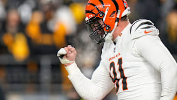 Cincinnati Bengals defensive end Trey Hendrickson (91) celebrates as the Steelers prepare to punt in the fourth quarter of the NFL Week 18 game between the Pittsburgh Steelers and the Cincinnati Bengals at Acrisure Stadium in Pittsburgh on Saturday, Jan. 4, 2025. The Bengals won 19-17 to finish the regular season at 9-8.