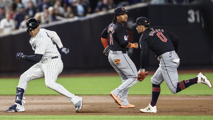 Aug 21, 2024; Bronx, New York, USA;  Cleveland Guardians second baseman Andrés Giménez (0) chases New York Yankees right fielder Juan Soto (22) during a run-down in the fourth inning at Yankee Stadium. Mandatory Credit: Wendell Cruz-USA TODAY Sports